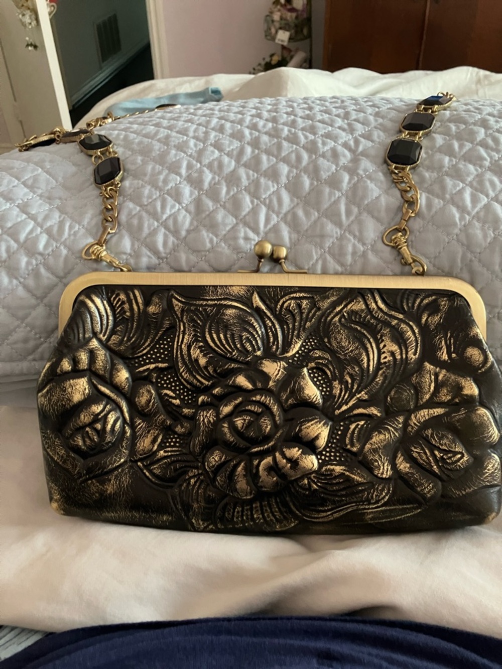 Patricia Nash Gold and Black Embossed Floral Frame Clutch
